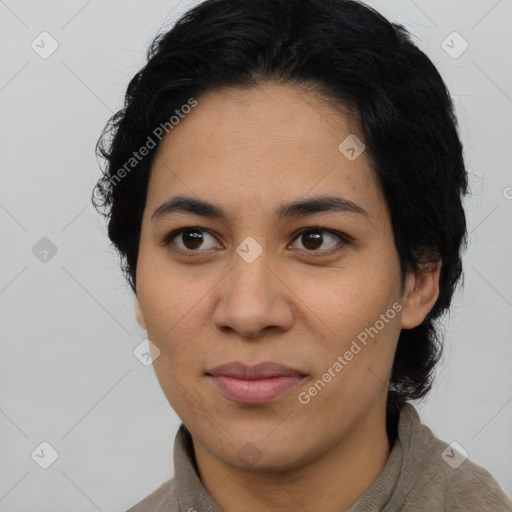 Joyful latino young-adult female with medium  black hair and brown eyes