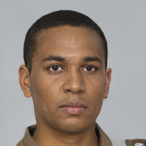 Neutral latino young-adult male with short  brown hair and brown eyes