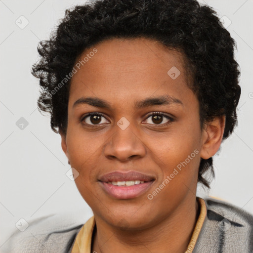 Joyful black young-adult female with short  brown hair and brown eyes