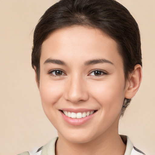 Joyful white young-adult female with medium  brown hair and brown eyes