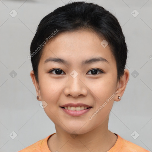 Joyful asian young-adult female with short  brown hair and brown eyes