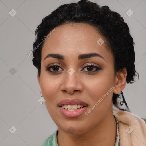 Joyful latino young-adult female with long  black hair and brown eyes