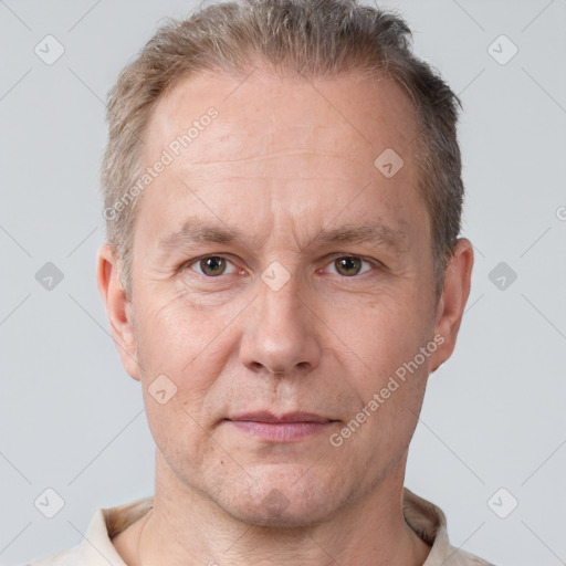 Neutral white adult male with short  brown hair and brown eyes