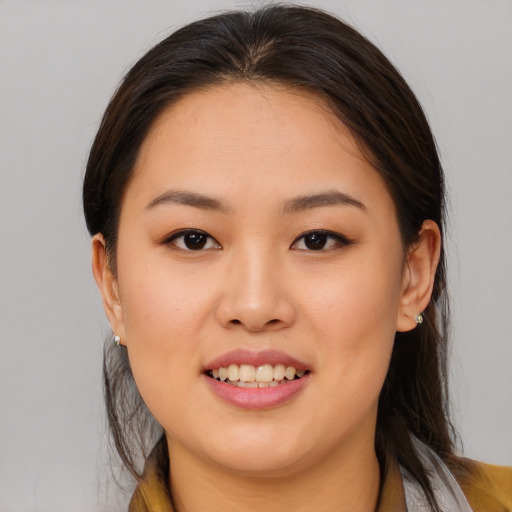 Joyful white young-adult female with medium  brown hair and brown eyes