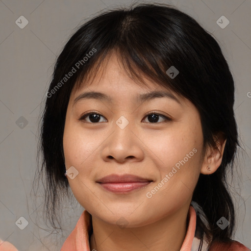 Joyful asian young-adult female with medium  brown hair and brown eyes