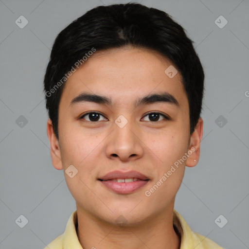 Joyful asian young-adult male with short  brown hair and brown eyes