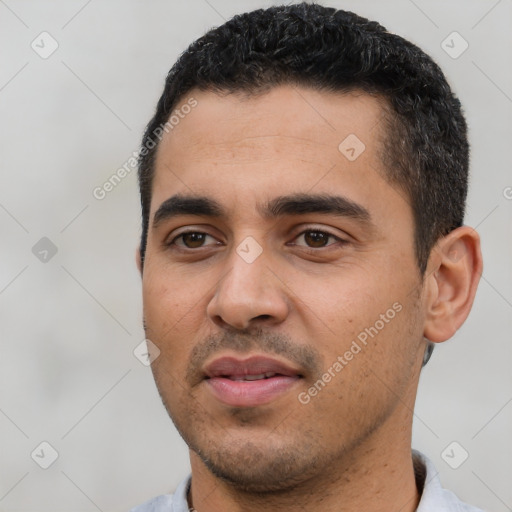 Neutral latino young-adult male with short  black hair and brown eyes