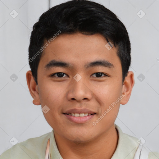 Joyful asian young-adult male with short  black hair and brown eyes