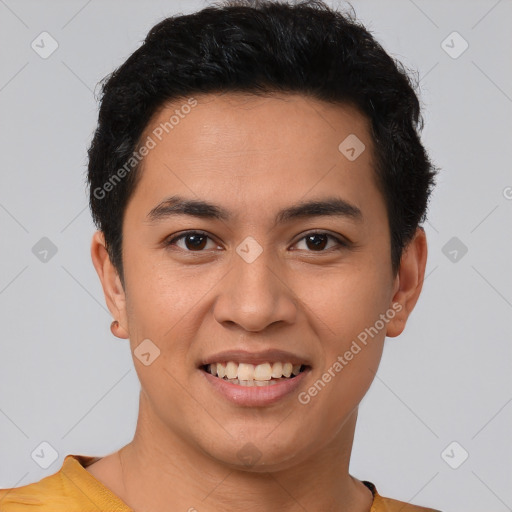 Joyful latino young-adult male with short  brown hair and brown eyes