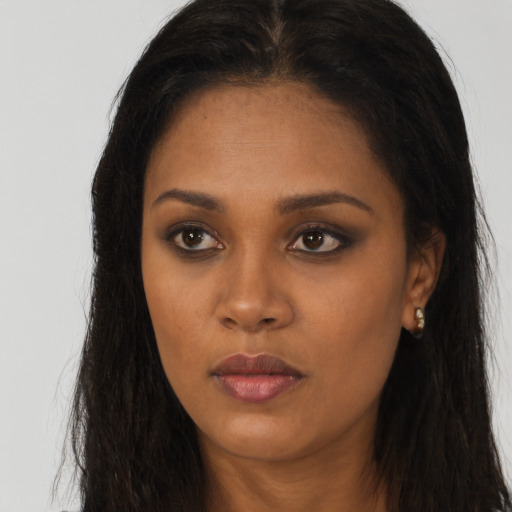 Neutral asian young-adult female with long  brown hair and brown eyes