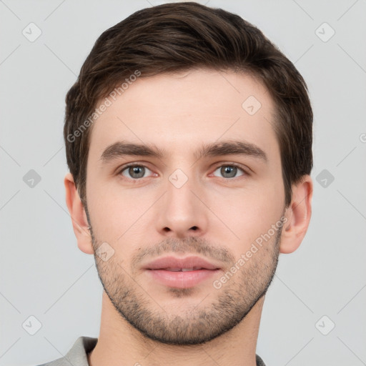 Neutral white young-adult male with short  brown hair and brown eyes