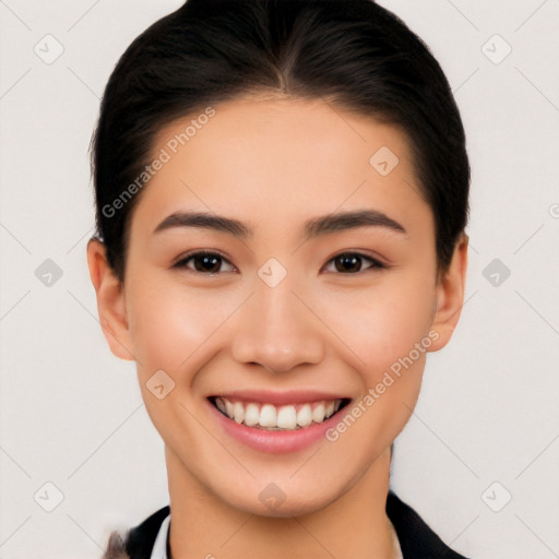 Joyful white young-adult female with medium  black hair and brown eyes