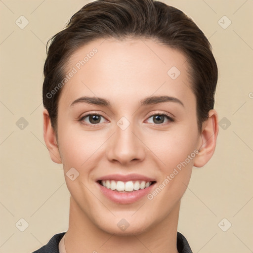 Joyful white young-adult female with short  brown hair and brown eyes