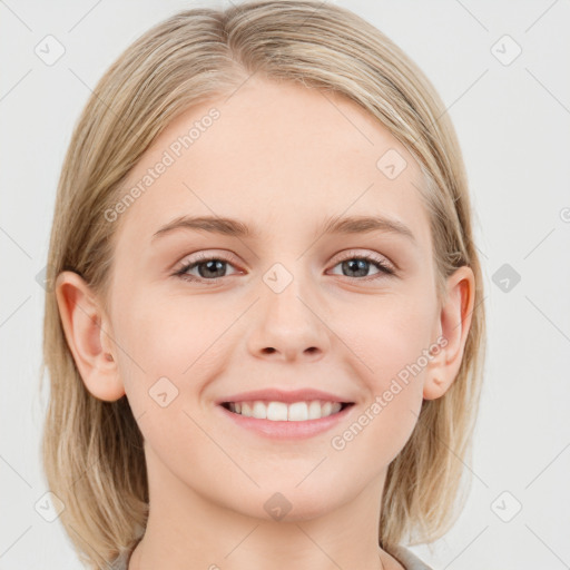 Joyful white young-adult female with long  brown hair and blue eyes