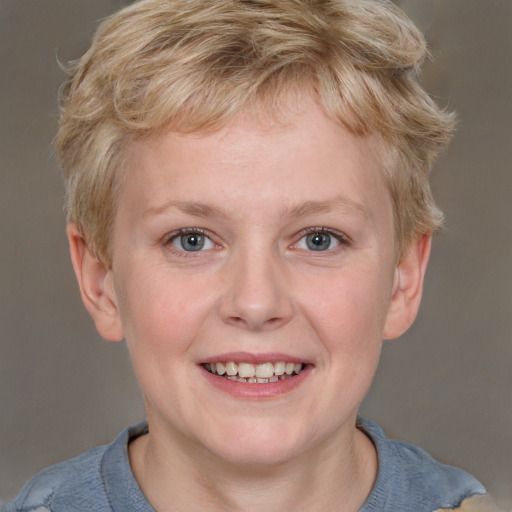 Joyful white young-adult female with short  brown hair and blue eyes