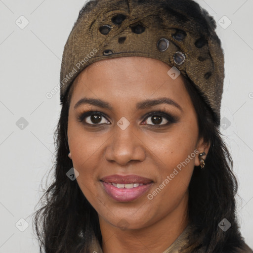 Joyful black young-adult female with long  brown hair and brown eyes