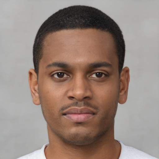 Neutral latino young-adult male with short  brown hair and brown eyes