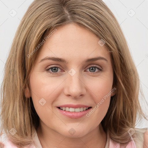 Joyful white young-adult female with medium  brown hair and green eyes