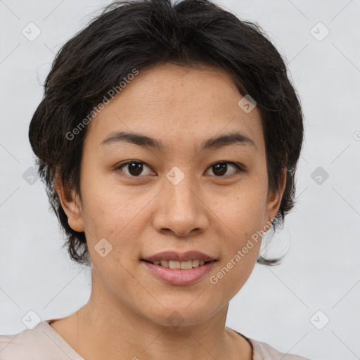 Joyful asian young-adult female with medium  brown hair and brown eyes