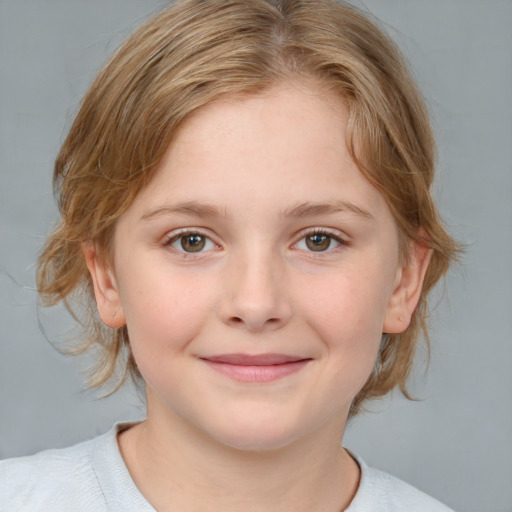 Joyful white child female with medium  brown hair and grey eyes