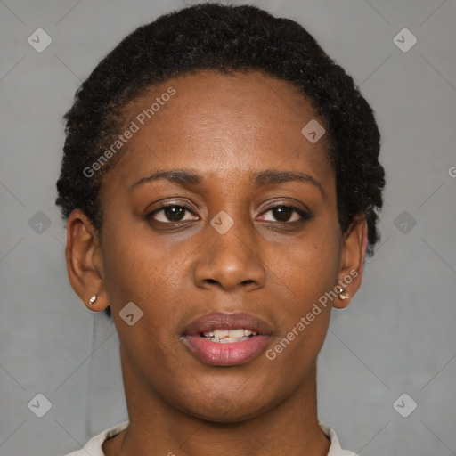 Joyful black young-adult female with short  brown hair and brown eyes