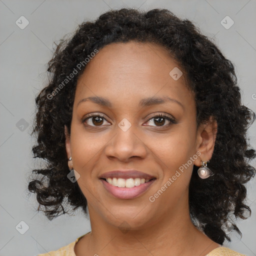 Joyful black young-adult female with medium  brown hair and brown eyes