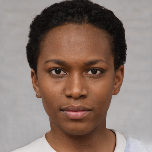 Neutral black young-adult female with short  black hair and brown eyes