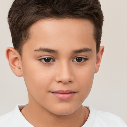 Joyful white child male with short  brown hair and brown eyes