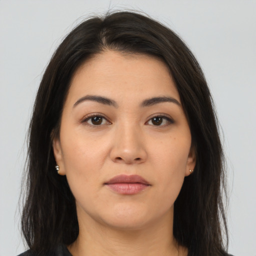 Neutral latino young-adult female with long  brown hair and brown eyes