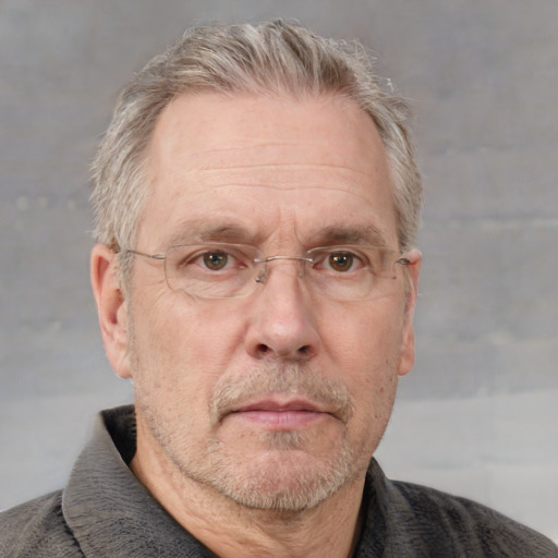 Neutral white middle-aged male with short  gray hair and grey eyes