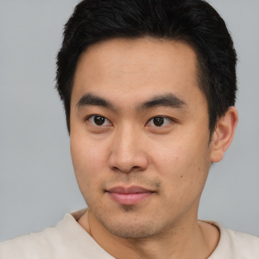 Neutral asian young-adult male with short  black hair and brown eyes