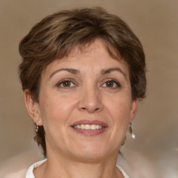 Joyful white adult female with short  brown hair and brown eyes