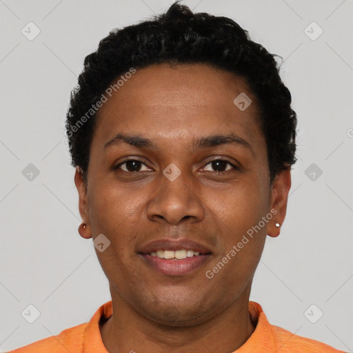 Joyful black young-adult female with short  black hair and brown eyes