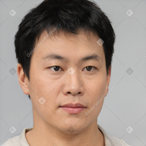 Neutral asian young-adult male with short  brown hair and brown eyes