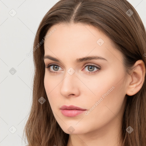 Neutral white young-adult female with long  brown hair and brown eyes