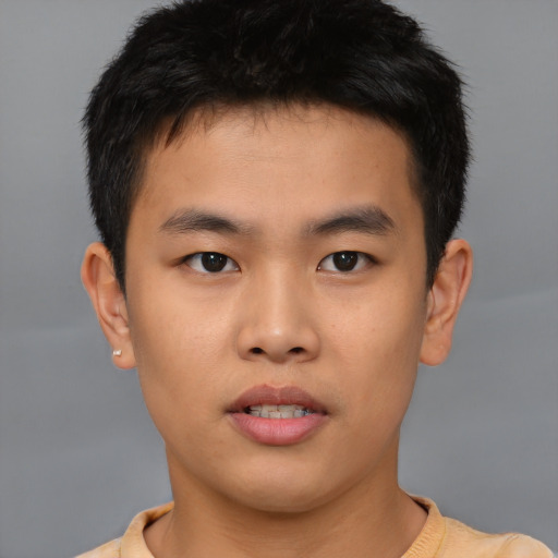 Neutral asian young-adult male with short  brown hair and brown eyes