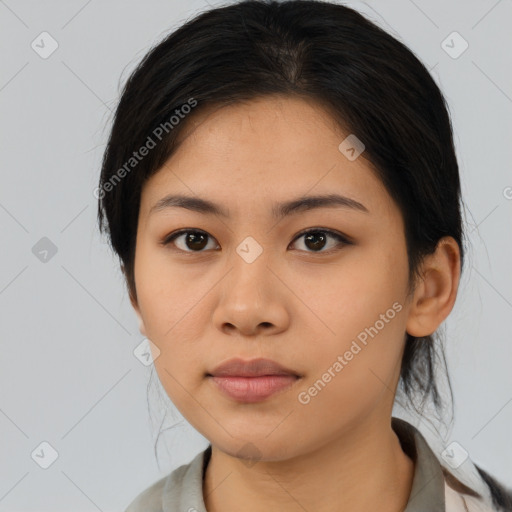 Neutral asian young-adult female with medium  brown hair and brown eyes