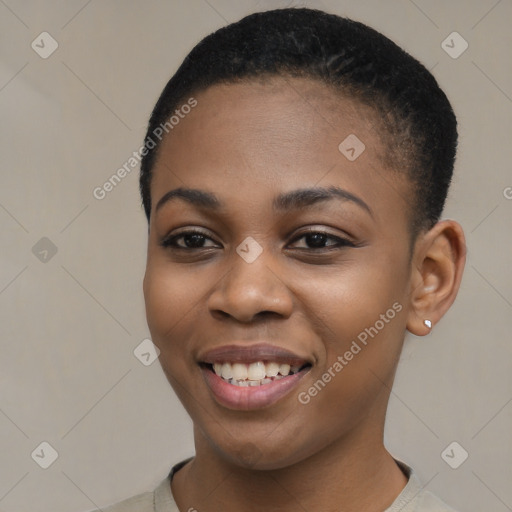 Joyful black young-adult female with short  brown hair and brown eyes