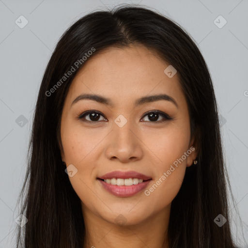 Joyful asian young-adult female with long  brown hair and brown eyes