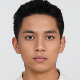 Neutral asian young-adult male with short  black hair and brown eyes