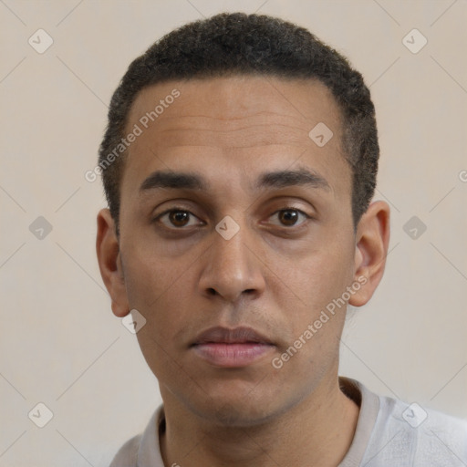 Neutral latino young-adult male with short  black hair and brown eyes