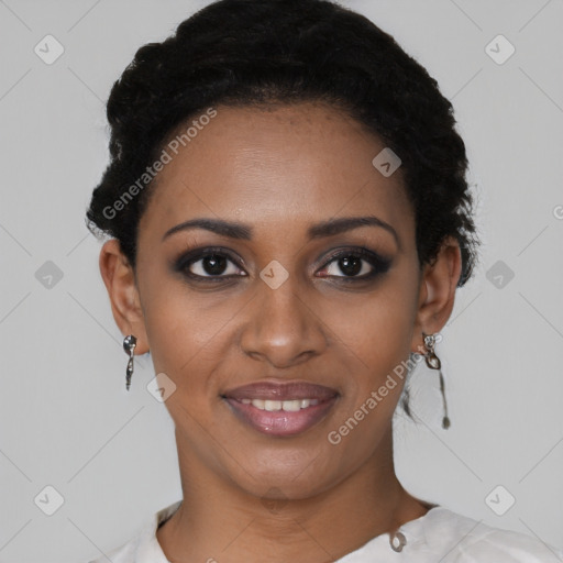 Joyful black young-adult female with short  black hair and brown eyes