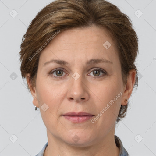 Joyful white adult female with short  brown hair and grey eyes