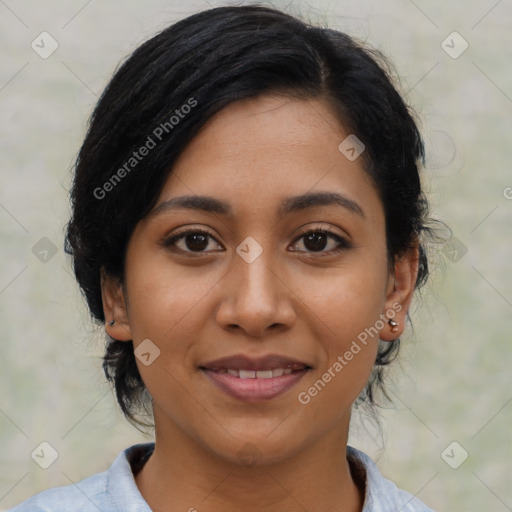 Joyful latino young-adult female with medium  black hair and brown eyes