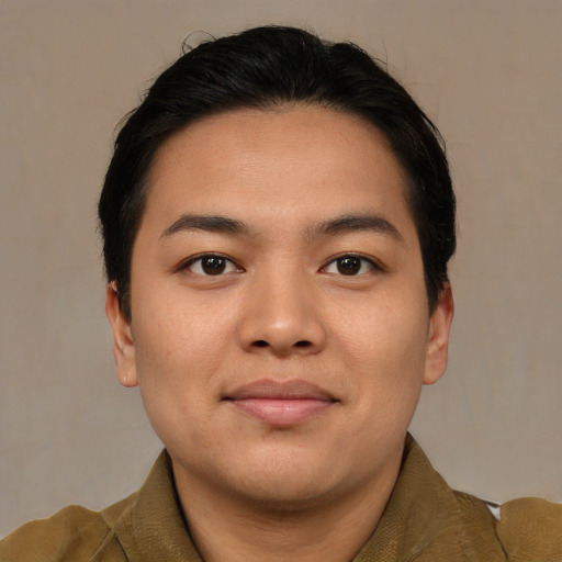 Joyful asian young-adult male with short  brown hair and brown eyes