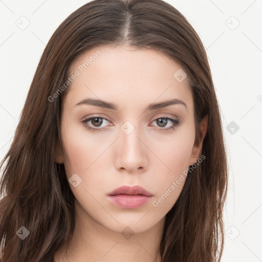 Neutral white young-adult female with long  brown hair and brown eyes