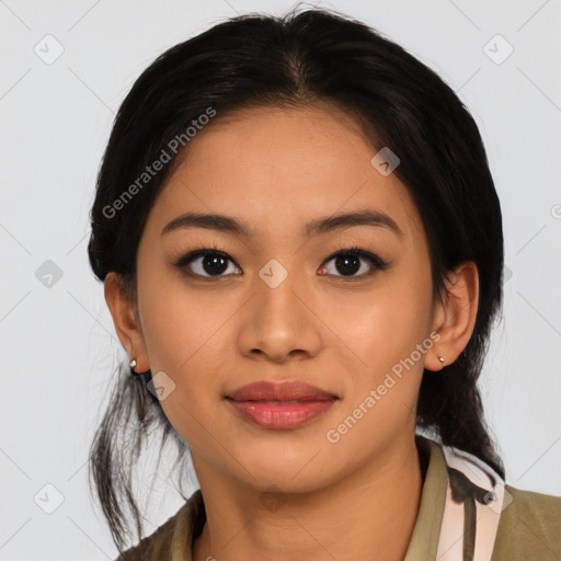 Joyful latino young-adult female with medium  black hair and brown eyes