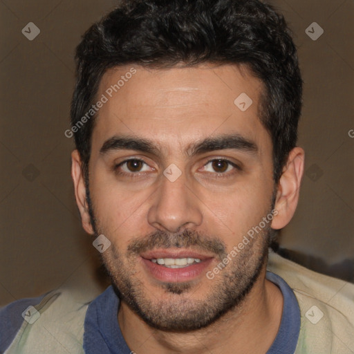 Joyful white young-adult male with short  black hair and brown eyes