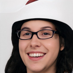 Joyful white young-adult female with long  black hair and brown eyes