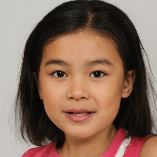 Joyful white child female with medium  brown hair and brown eyes